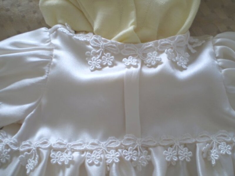 Ivory satin christening gown bodice with delicate embroidered floral motif and lace trim — Kingdom Gowns Michigan